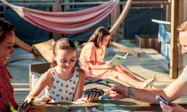 Family games on the terrace of a mobile home at Les Embruns